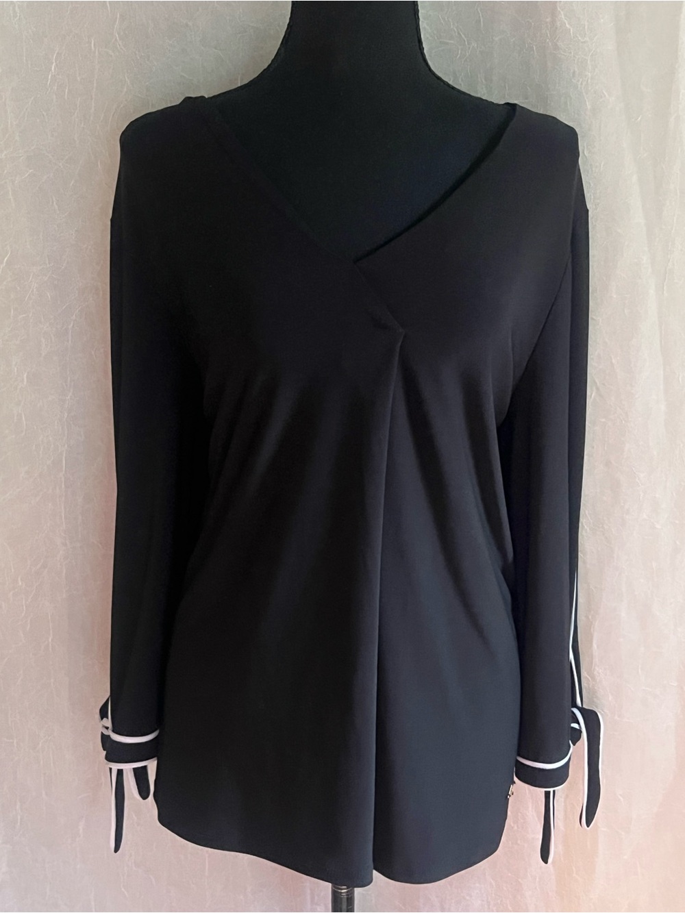 Anne Klein Black dressy v neck top with black and white tie sleeve